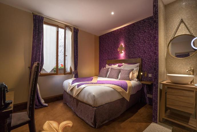 Imagen de la habitación del Hotel Le Temple De Jeanne. Foto 7