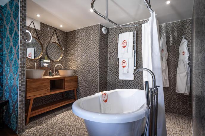 Imagen de la habitación del Hotel Le Temple De Jeanne. Foto 8