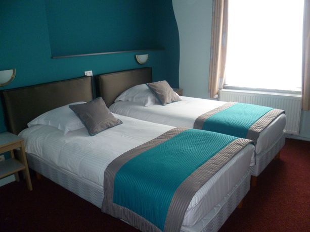 Imagen de la habitación del Hotel Le Terminus. Foto 14