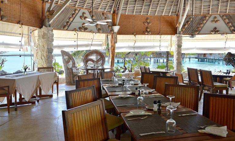 Imagen del bar/restaurante del Hotel Le Tikehau By Pearl Resorts. Foto 2