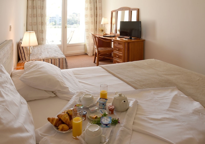 Imagen de la habitación del Hotel Le Tilbury. Foto 12