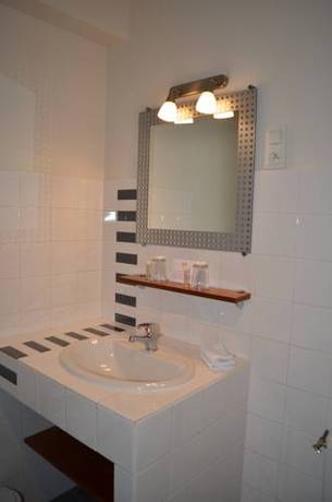 Imagen de la habitación del Hotel Le Toeno. Foto 13
