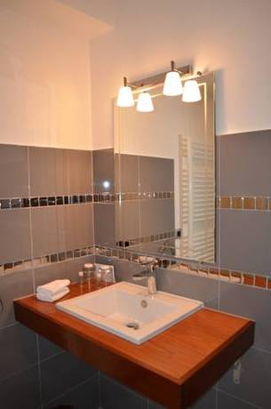 Imagen de la habitación del Hotel Le Toeno. Foto 15