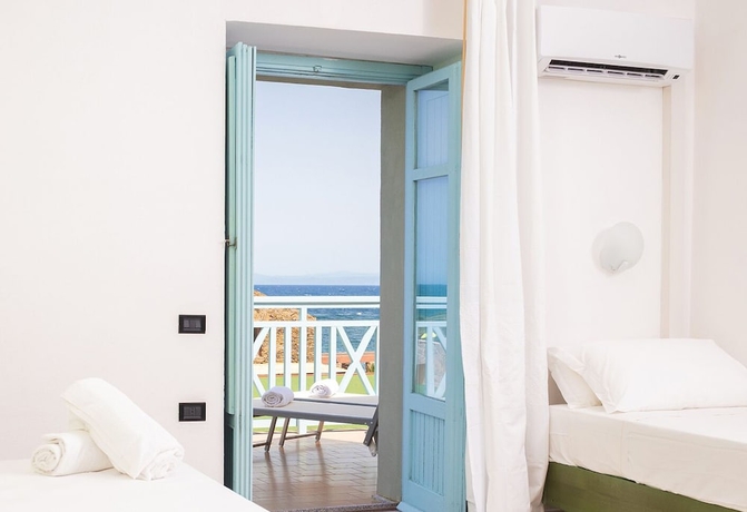 Imagen de la habitación del Hotel Le Tonnare Di Stintino - Beach Resort. Foto 14