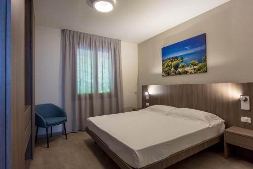 Imagen de la habitación del Hotel Le Torri Del Garda Familyspa Resort. Foto 8