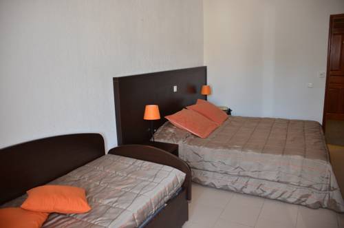 Imagen de la habitación del Hotel Le Tourisme. Foto 2