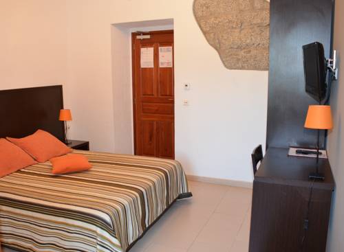 Imagen de la habitación del Hotel Le Tourisme. Foto 3