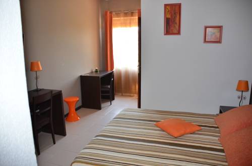 Imagen de la habitación del Hotel Le Tourisme. Foto 4