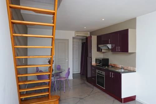 Imagen de la habitación del Hotel Le Tourisme. Foto 7