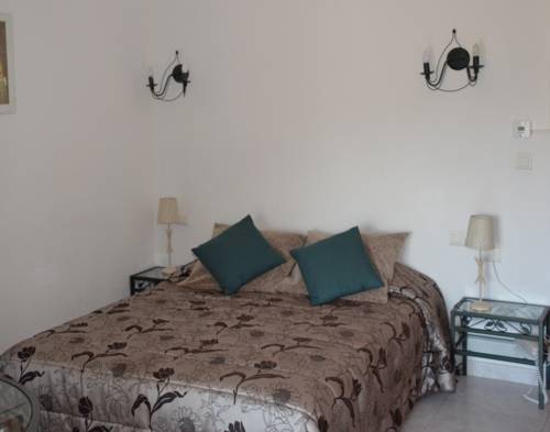 Imagen de la habitación del Hotel Le Tourisme. Foto 12