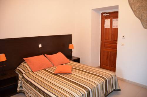 Imagen de la habitación del Hotel Le Tourisme. Foto 13