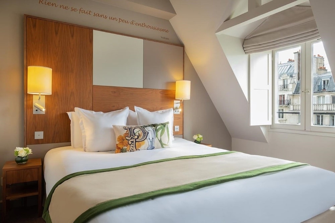 Imagen de la habitación del Hotel Le Tourville by Inwood Hotels. Foto 2