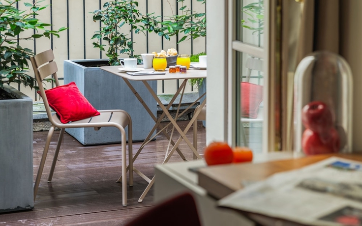 Imagen de la habitación del Hotel Le Tourville by Inwood Hotels. Foto 4