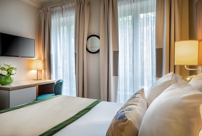 Imagen de la habitación del Hotel Le Tourville by Inwood Hotels. Foto 6