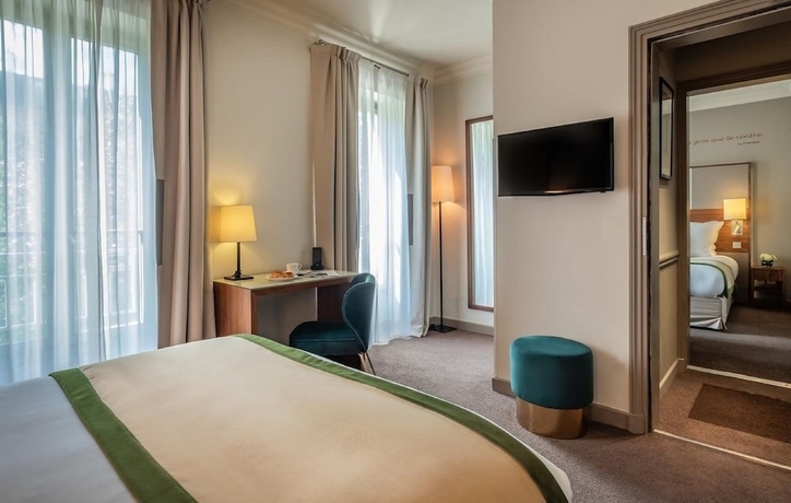 Imagen de la habitación del Hotel Le Tourville by Inwood Hotels. Foto 10