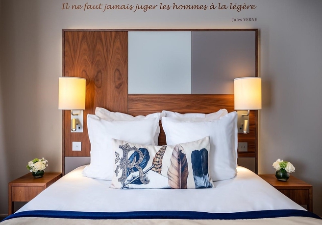 Imagen de la habitación del Hotel Le Tourville by Inwood Hotels. Foto 13