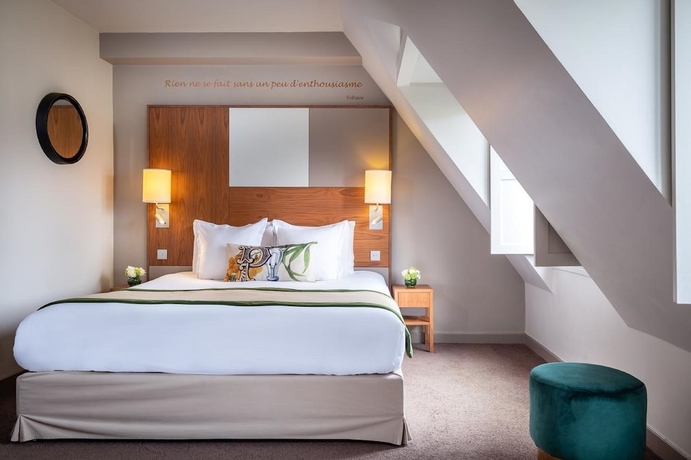 Imagen de la habitación del Hotel Le Tourville by Inwood Hotels. Foto 14