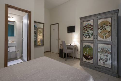 Imagen de la habitación del Hotel Le Tre Isole. Foto 8