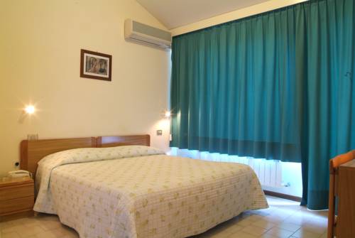 Imagen de la habitación del Hotel Le Tre Isole. Foto 12