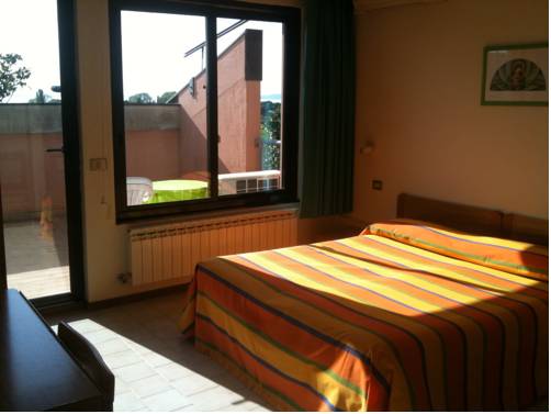 Imagen de la habitación del Hotel Le Tre Isole. Foto 14
