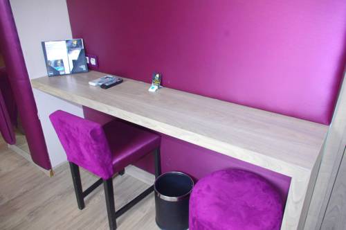 Imagen de la habitación del Hotel Le Trèfle. Foto 6