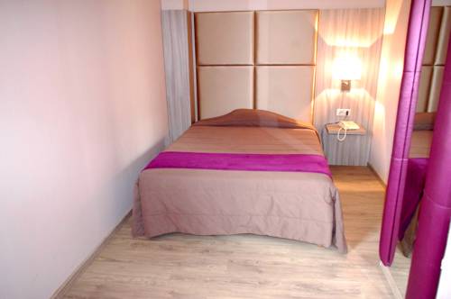 Imagen de la habitación del Hotel Le Trèfle. Foto 9