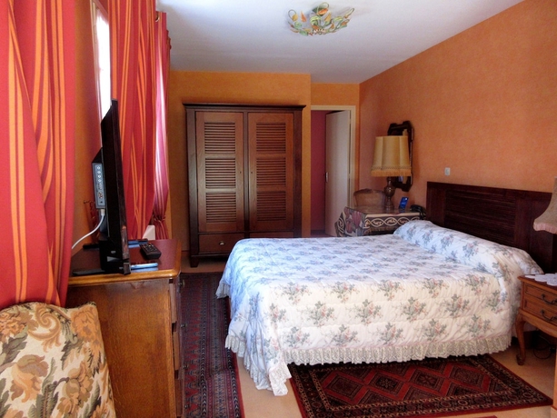 Imagen de la habitación del Hotel Le Trianon. Foto 8
