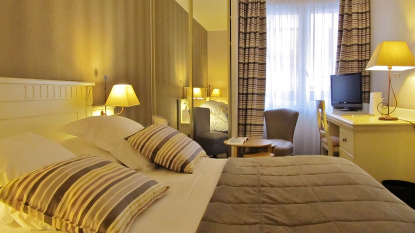 Imagen de la habitación del Hotel Le Trophée By M and Spa. Foto 5