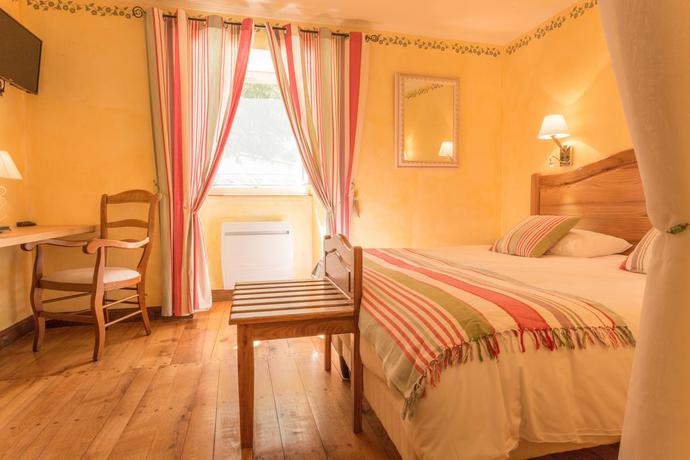 Imagen de la habitación del Hotel Le Troubadour. Foto 3
