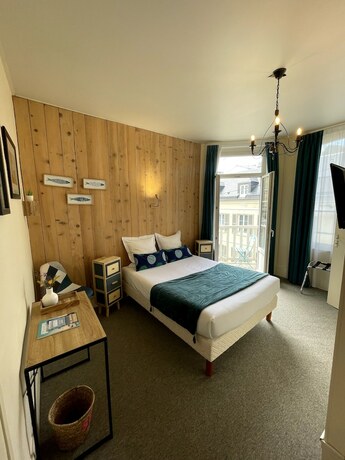 Imagen de la habitación del Hotel Le Trouville. Foto 13