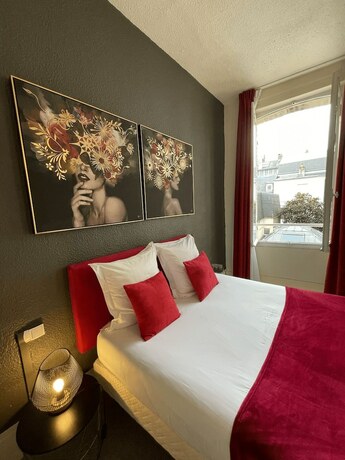 Imagen de la habitación del Hotel Le Trouville. Foto 19
