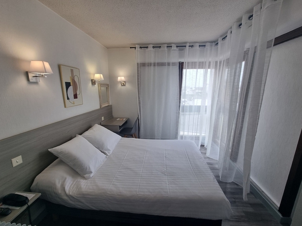 Imagen de la habitación del Hotel Le Vascon. Foto 7