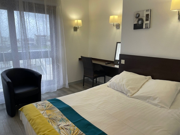 Imagen de la habitación del Hotel Le Vascon. Foto 8