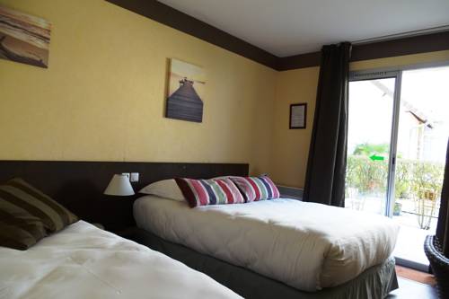 Imagen de la habitación del Hotel Le Vauban, Merville-Franceville-Plage. Foto 10