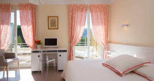 Imagen de la habitación del Hotel Le Verdon. Foto 4