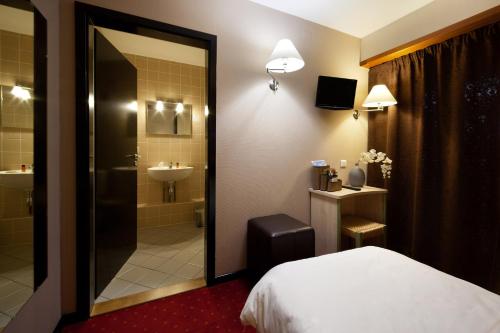 Imagen de la habitación del Hotel Le Verger De Bischwiller. Foto 6