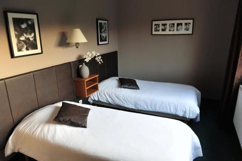 Imagen de la habitación del Hotel Le Verger De Bischwiller. Foto 8