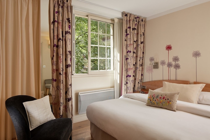 Imagen de la habitación del Hotel Le Vert Galant. Foto 10