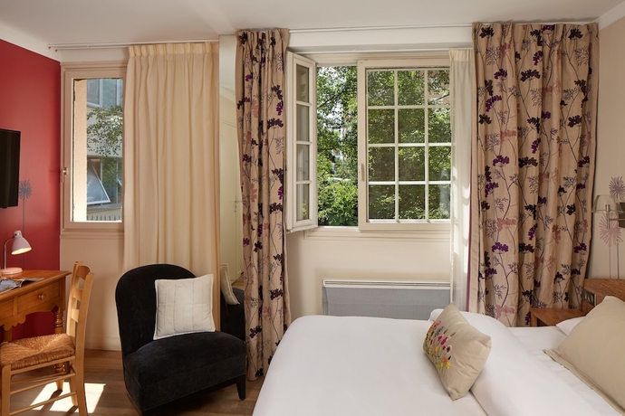 Imagen de la habitación del Hotel Le Vert Galant. Foto 12