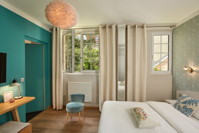 Imagen de la habitación del Hotel Le Vert Galant. Foto 14