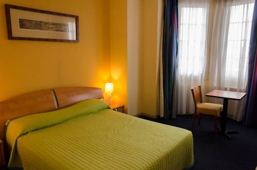 Imagen de la habitación del Hotel Le Vieux Beffroi. Foto 2
