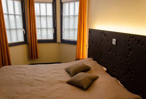 Imagen de la habitación del Hotel Le Vieux Beffroi. Foto 3