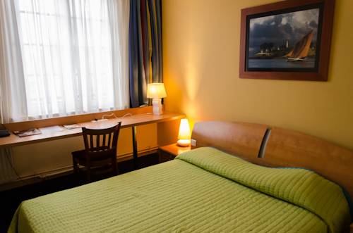 Imagen de la habitación del Hotel Le Vieux Beffroi. Foto 9