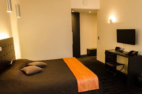Imagen de la habitación del Hotel Le Vieux Beffroi. Foto 10