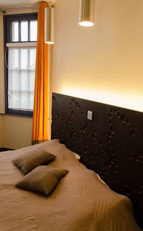 Imagen de la habitación del Hotel Le Vieux Beffroi. Foto 11