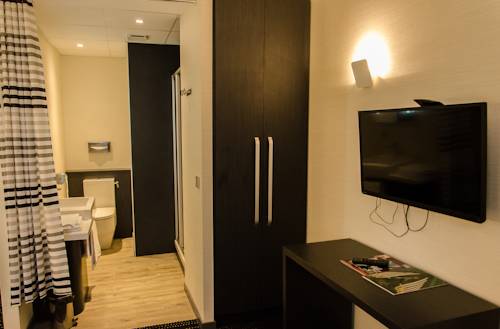 Imagen de la habitación del Hotel Le Vieux Beffroi. Foto 13
