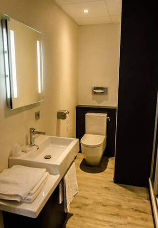 Imagen de la habitación del Hotel Le Vieux Beffroi. Foto 16