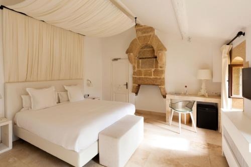 Imagen de la habitación del Hotel Le Vieux Castillon. Foto 7