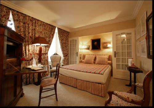 Imagen de la habitación del Hotel Le Vieux Logis, Tremolat. Foto 11