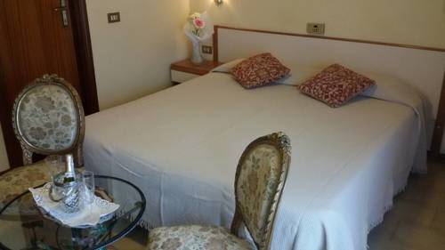 Imagen de la habitación del Hotel Le Vigne. Foto 7